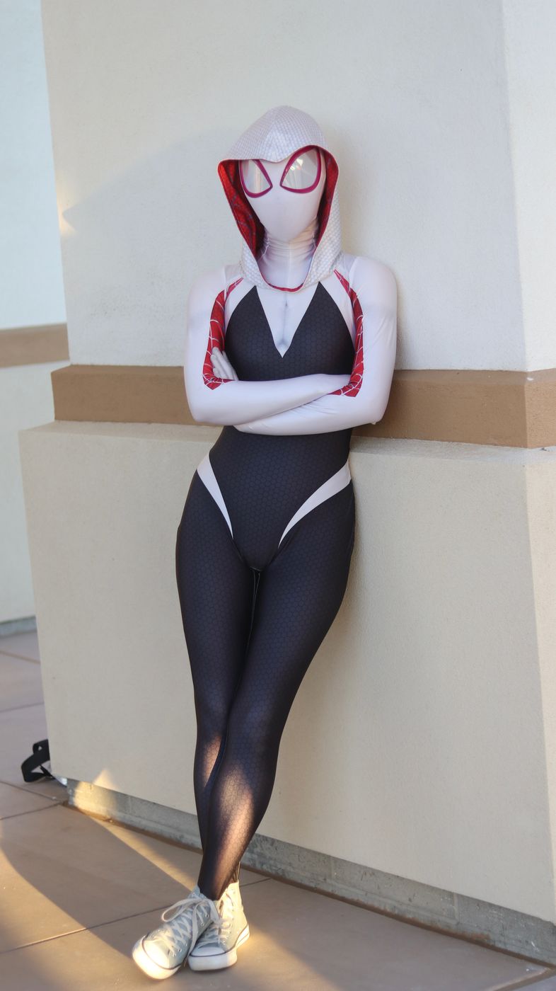 Ghost spider hero character in white hooded suit